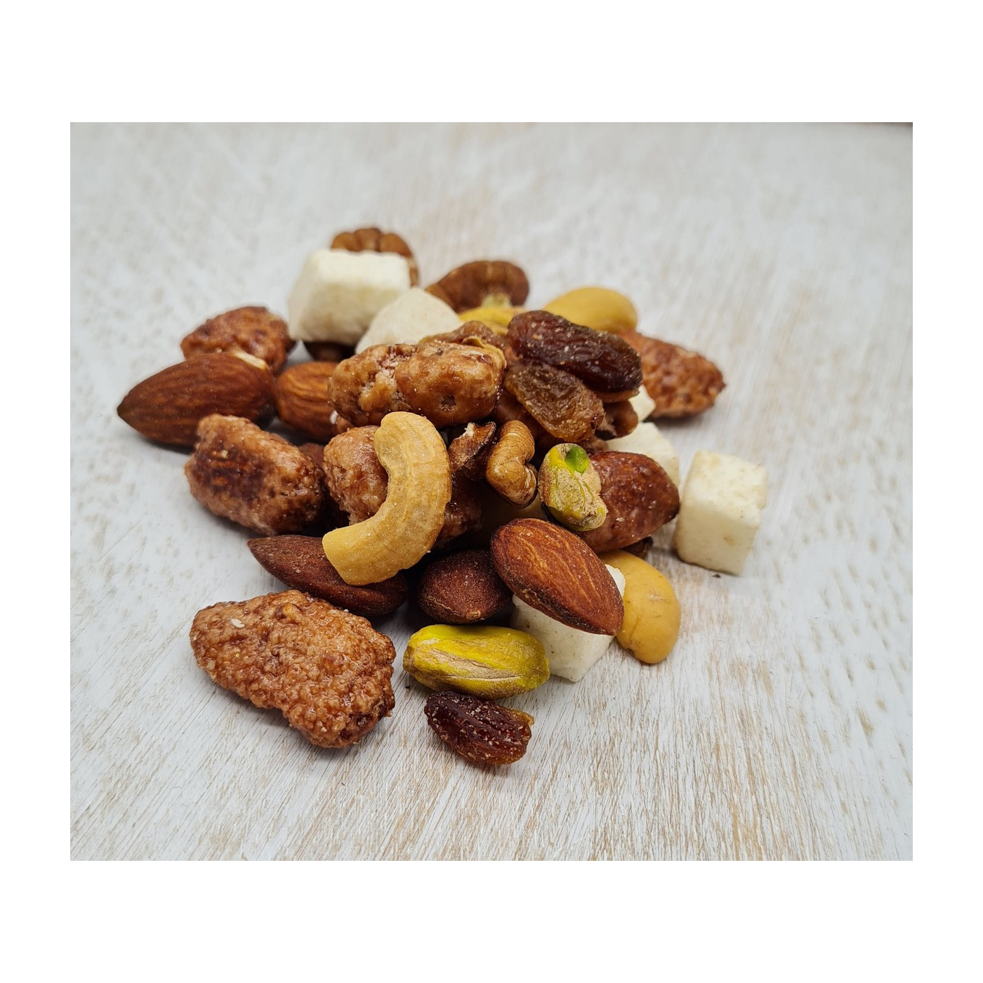 Ponchimix
Mandeln, Cashewkerne, Rosinen, Pecannüsse, Pistazien & Kokos-gewürzt
1kg im Beutel